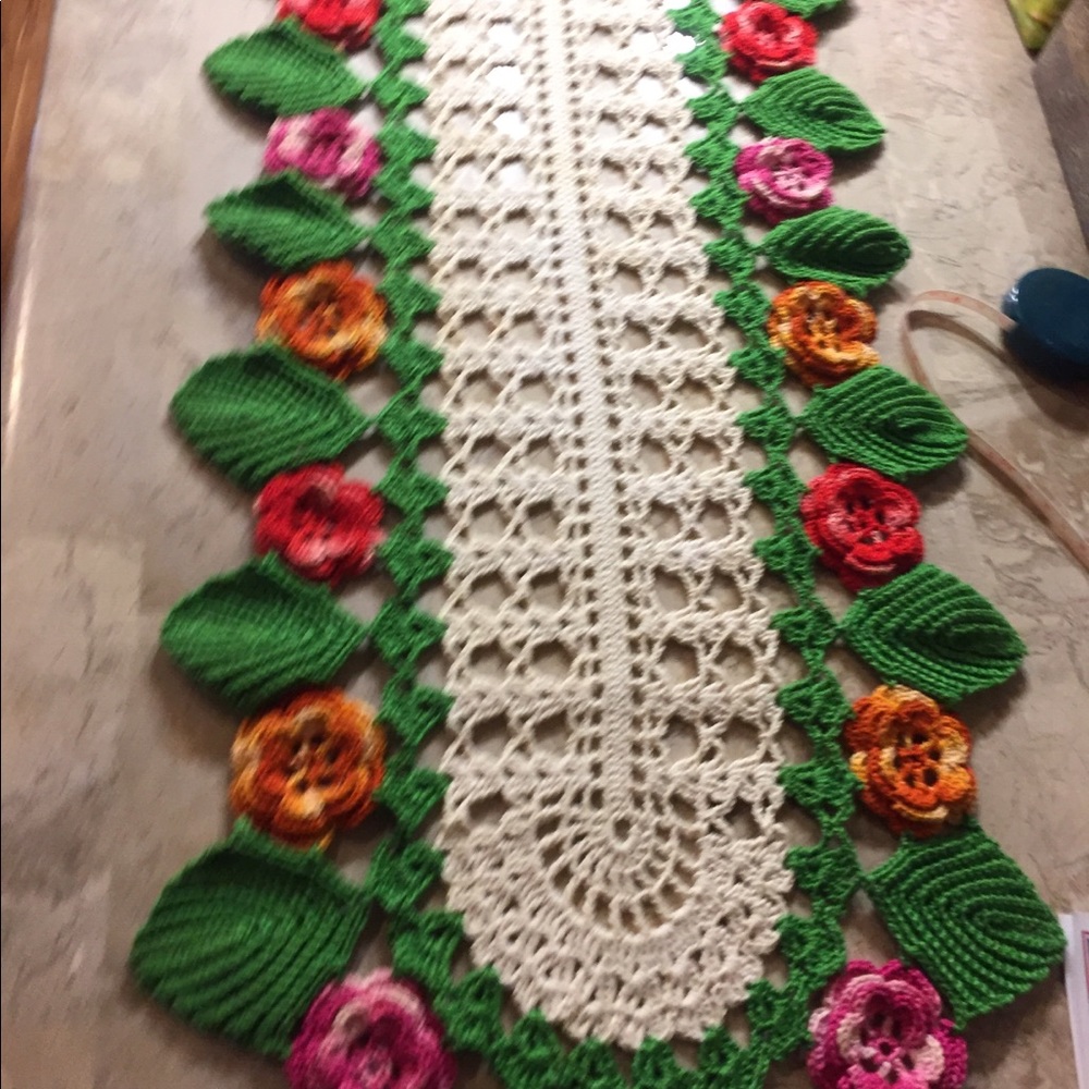 A beautifully made crocheted table runner.